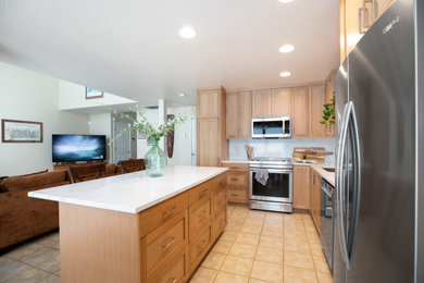 Example of a mid-sized transitional kitchen design in Portland