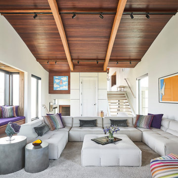 Contemporary Family Room in a Figure Eight Island Custom Home