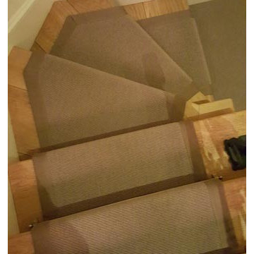 Brown Carpet Runner With Border to Stairs