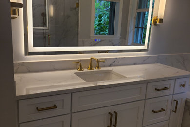 Example of a transitional bathroom design in Miami