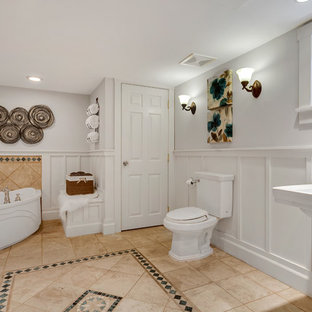 Bathroom - large craftsman white tile ceramic floor and white floor bathroom idea in Seattle with recessed-panel cabinets, white cabinets, white walls and white countertops