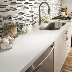 Corian&reg; Designer White countertop featured with sink. - Kitchen Countertops