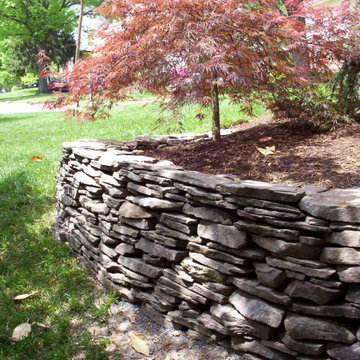 Silver Spring foundation planting and dry creek bed