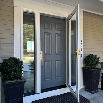 Full-view storm door paired with entry door for ventilation and protection - Mad