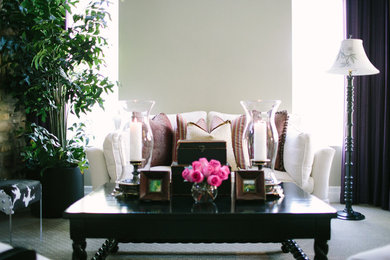 Inspiration for a mid-sized transitional open concept carpeted living room remodel in Orange County with green walls, no fireplace and no tv