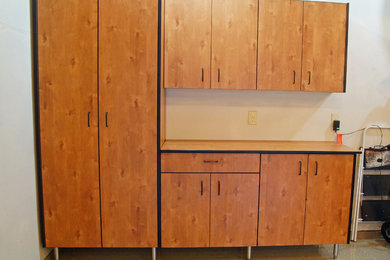 Example of a small classic attached garage design in Minneapolis
