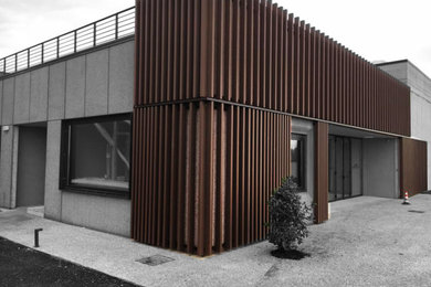 Idee per la facciata di una casa industriale con rivestimento in legno