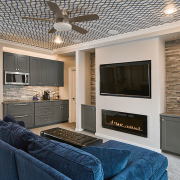 Gray built-ins and wallpaper ceiling