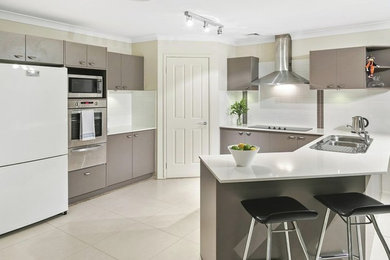 This is an example of a large modern kitchen in Sydney.