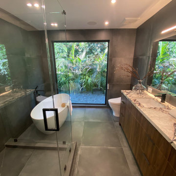 Hollywood Hills Spa Bathroom with Freestanding Tub and Garden Views