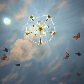 Sky Ceiling Mural with Butterflies, hand-painted in a bedroom by Mural Art LLC.