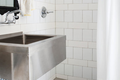 Inspiration for a small eclectic bathroom in Nashville with subway tile, white walls, cement tiles, a wall-mount sink, multi-coloured floor, a shower curtain and white benchtops.