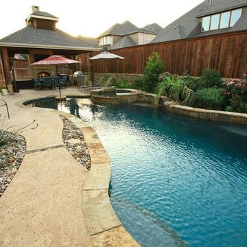 Swimming Pool with Low Rock Waterfall