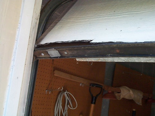 Want Ideas for Repairing Old Cracked Bottom Panel on Garage Door