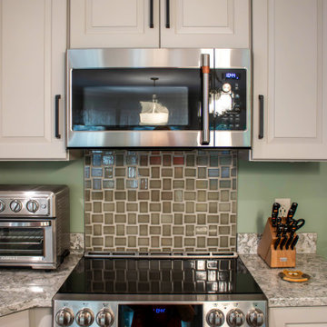 Two Tone Kitchen with Irish Creme Cabinets and Rustic Dockside Island