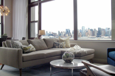 Example of a trendy living room design in New York