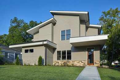 Design ideas for a mid-sized modern two-storey brown exterior in Atlanta with concrete fiberboard siding.