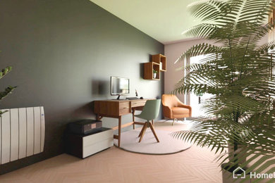 Modelo de despacho moderno de tamaño medio sin chimenea con paredes verdes y suelo de madera clara