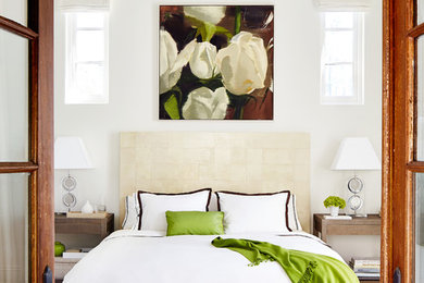 Example of a large transitional master carpeted bedroom design in San Francisco with white walls and no fireplace