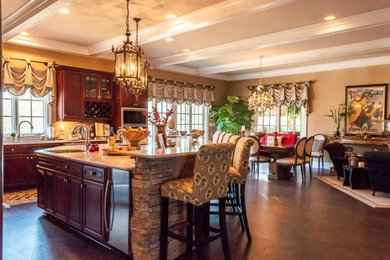 Eat-in kitchen - huge transitional l-shaped cork floor eat-in kitchen idea in Baltimore with a drop-in sink, dark wood cabinets, beige backsplash, ceramic backsplash, stainless steel appliances and an island