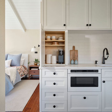 Built-In Kitchen Storage with Concealed Appliance Space in ADU Kitchenette