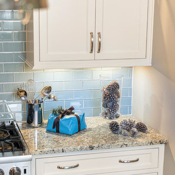 White Cabinets and Blue Subway Tile
