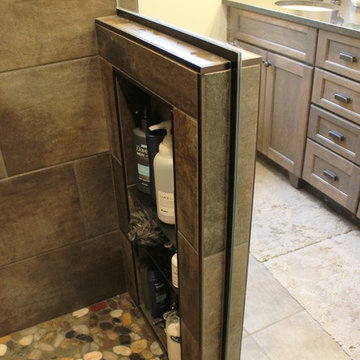 Moline, IL Bath Remodel With Gray Stained Cherry Vanity and Pebble Tiled Shower