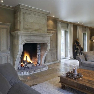 Inspiration for a medium sized mediterranean formal open plan living room in New York with grey walls, limestone flooring, a standard fireplace, a stone fireplace surround and no tv.