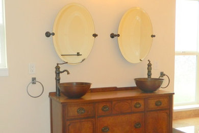 Mid-sized transitional master beige tile and ceramic tile ceramic tile alcove bathtub photo in Other with medium tone wood cabinets, white walls, a vessel sink and wood countertops