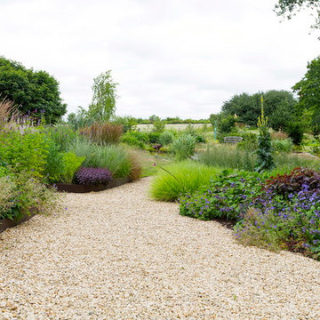 Complete Garden Makeover, Wallingford, Oxfordshire. Gravel paths with raised bed