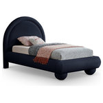 Meridian Furniture - Madrid Upholstered Bed, Navy, Twin, Velvet - Transform your bedroom with the bold and sophisticated charm of the Madrid navy velvet upholstered twin bed. Inspired by classic Art Deco design, this bed showcases a striking arched headboard and rounded edges for a unique, sculptural look. The luxurious velvet upholstery adds a layer of softness and warmth, making it a stunning centerpiece that combines artful design with everyday comfort.