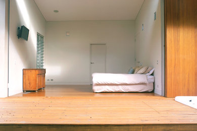 Design ideas for a contemporary bedroom in Sydney.