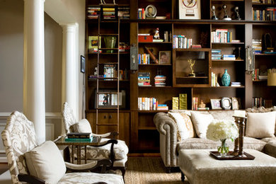 Inspiration for an expansive traditional open concept family room in DC Metro with beige walls, carpet, a library and brown floor.