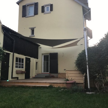 Création d'une terrasse bois avec voiles d'ombrage