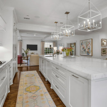Elegant Modern French Country Kitchen with Marble Accents and Floral Charm