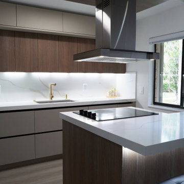 Functional Kitchen with Dark Cabinets and Light Countertop in South Florida