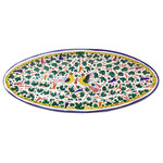Bonechi Imports - Deruta Labor Ceramiche Arabesco 22X9" Long Oval Serving Platter, Multi Green - This beautiful Italian platter is the perfect size and shape for serving fish. It would also be a wonderful serving dish for a main course with sides. With its two happy Arabesco birds flying amongst colorful leaves, it is a beautiful piece of Italian pottery hand painted in Deruta, Umbria.
