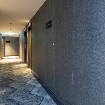 Hardware and piping kept out of sight through the hotel's hallways.