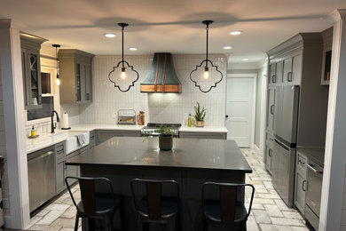 Farmhouse home design photo in Birmingham