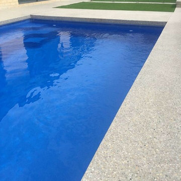 DS Grinding Services: Honed Concrete with infinity pool surround