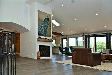 Example of a huge tuscan medium tone wood floor hallway design in Los Angeles