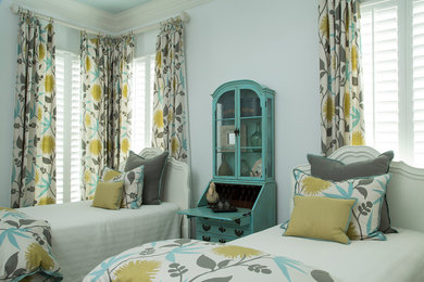 Example of a beach style bedroom design in Charleston