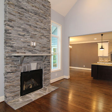 Large stone fireplace with flagstones