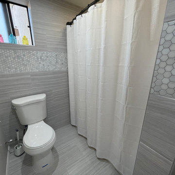 Bathroom Renovation - 1 large outdated to 2 modern