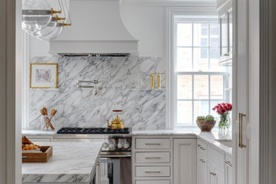 Enclosed kitchen - small transitional l-shaped dark wood floor and brown floor enclosed kitchen idea in Boston with an undermount sink, shaker cabinets, white cabinets, marble countertops, white backsplash, marble backsplash, paneled appliances, an island and white countertops