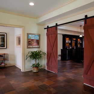 Medium sized classic fully buried basement in Atlanta with beige walls, terracotta flooring and no fireplace.
