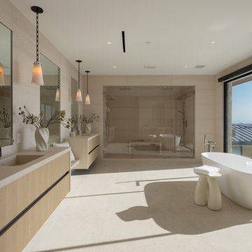 Oceanfront Limestone Spa Bathroom with Slab Walls - Malibu