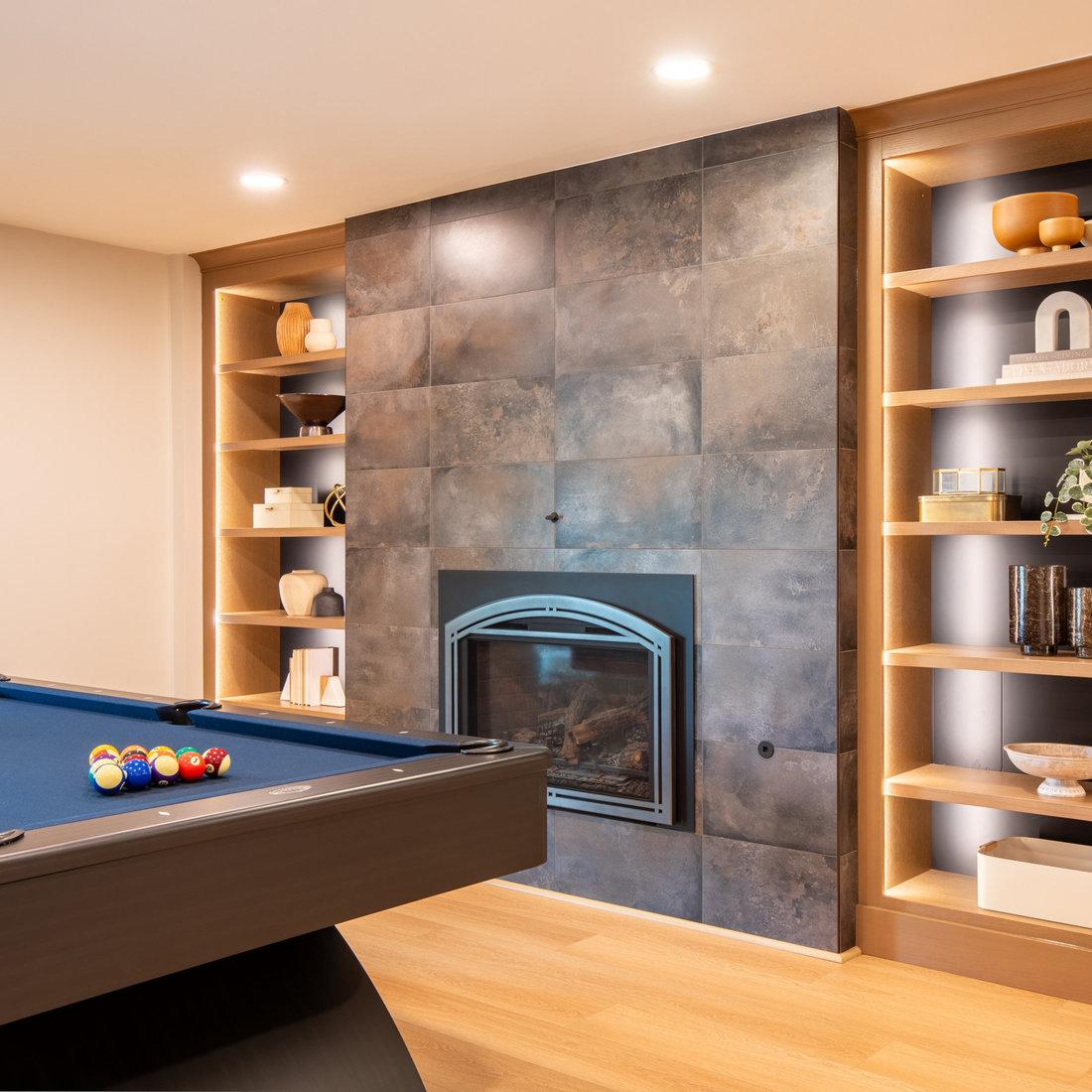 Updated Basement Fireplace with Custom Built-Ins