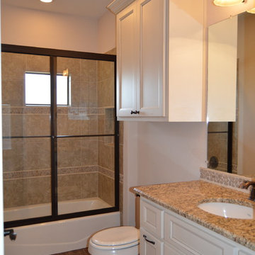 Simple elegance influenced this guest suite bathroom design.