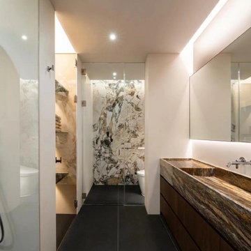 Brown natural marble wash basin solid wood bathroom cabinet.